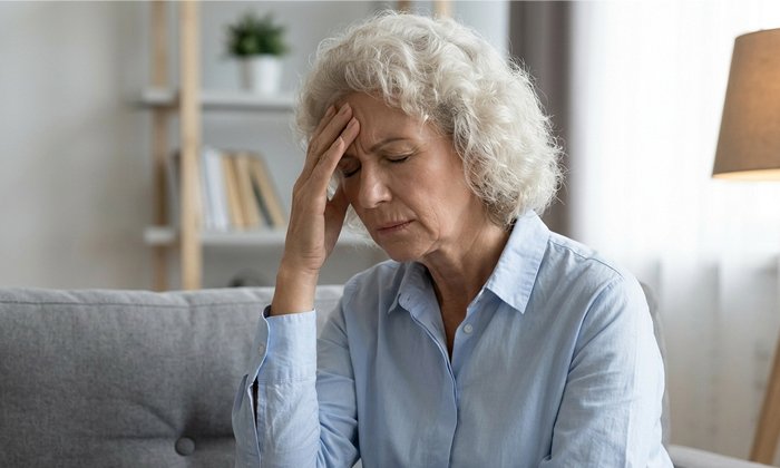 Головная боль у женщины